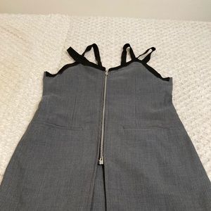 Corseted best with black spaghetti strap